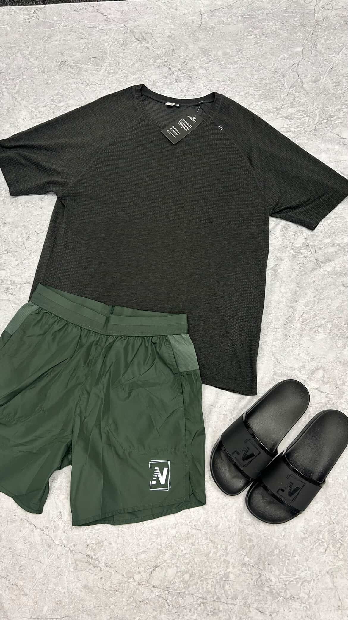 N logo Shorts