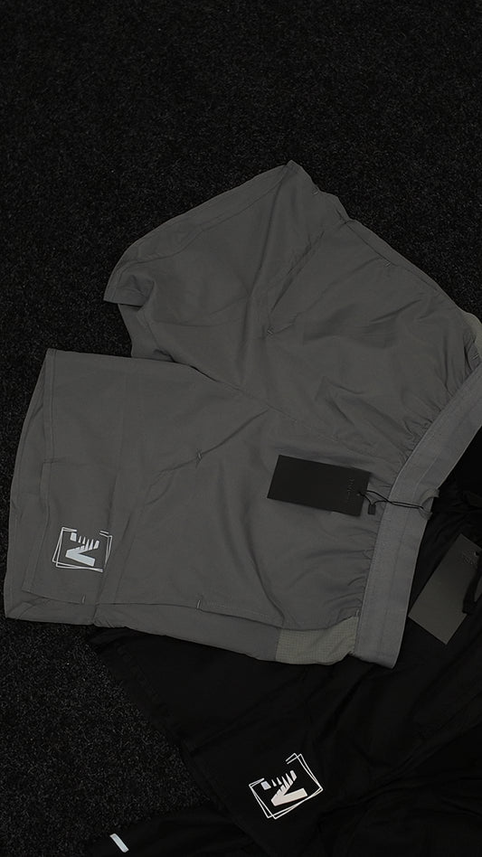 N logo Shorts