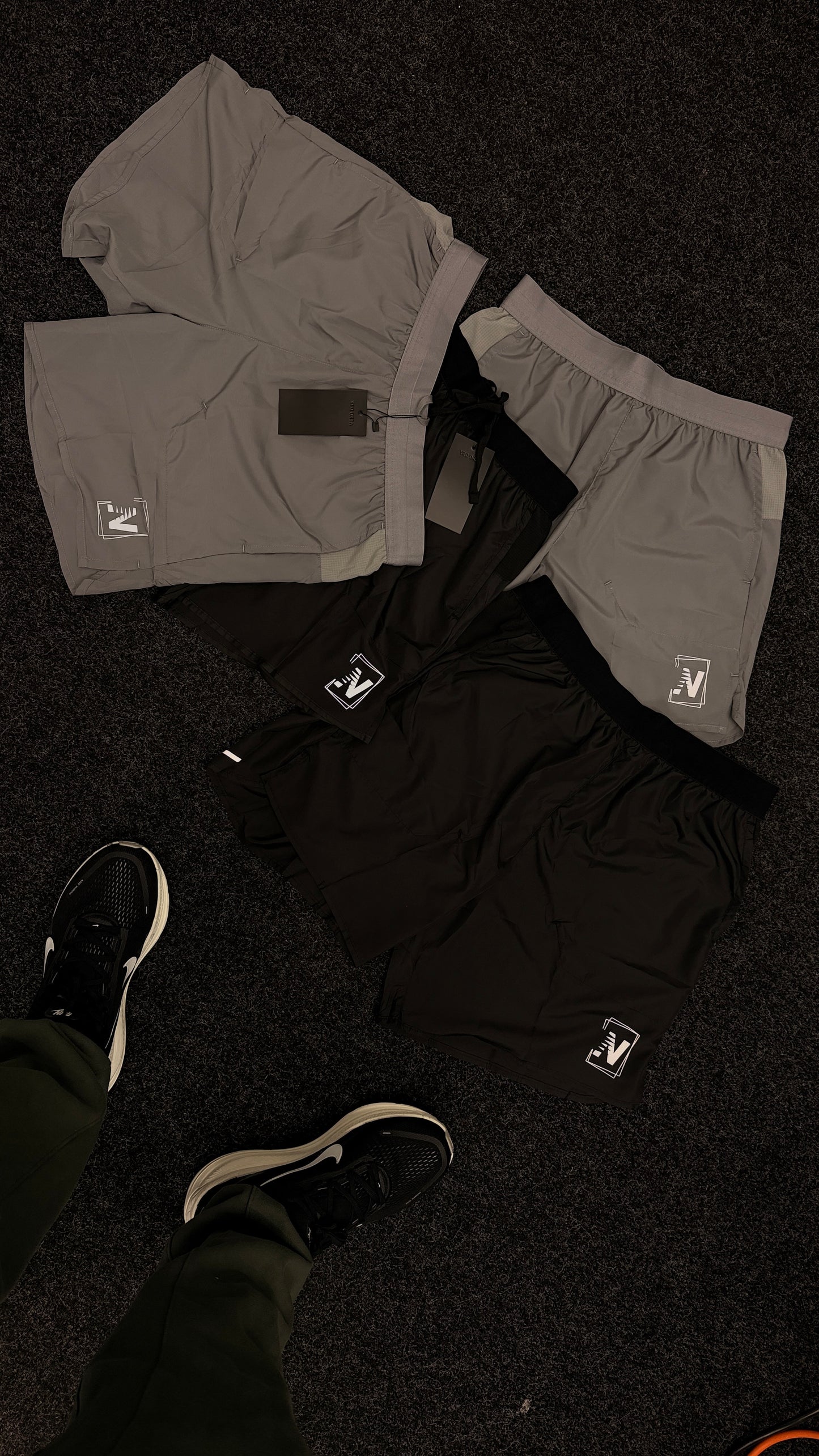 N logo Shorts