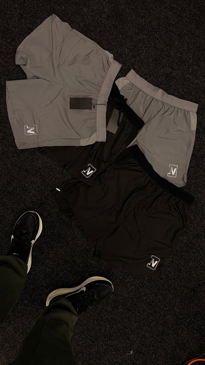 N logo Shorts
